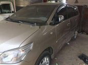 Cần bán xe Toyota Innova 2.0 đời 2014, màu hồng phấn, 590 triệu