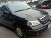 Cần bán gấp Kia Carnival đời 2008, màu đen xe gia đình