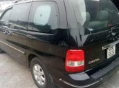 Cần bán gấp Kia Carnival đời 2008, màu đen xe gia đình