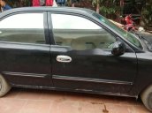 Bán xe Kia Spectra sản xuất 2005, màu đen, giá tốt