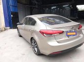 Chính chủ bán Kia Cerato 1.6 AT 2016, màu vàng cát