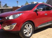 Bán xe Hyundai Tucson 2.0 AT 2010, màu đỏ, nhập khẩu nguyên chiếc, 590tr