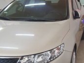 Bán Kia Forte 1.6 AT đời 2013, màu vàng cát