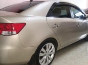 Bán Kia Forte 1.6 AT đời 2013, màu vàng cát