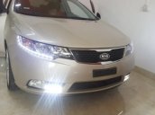 Bán Kia Forte 1.6 AT đời 2013, màu vàng cát