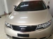 Bán Kia Forte 1.6 AT đời 2013, màu vàng cát