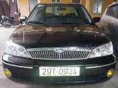 Chính chủ cần bán xe Ford Laser GHIA 1.8 sản xuất năm 2003, màu đen, giá cạnh tranh