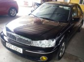 Chính chủ cần bán xe Ford Laser GHIA 1.8 sản xuất năm 2003, màu đen, giá cạnh tranh