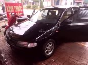 Bán Mazda 323 1.6 MT đời 1998, màu đen, nhập khẩu Nhật Bản