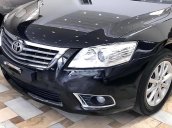 Cần bán lại xe Toyota Camry 2.4G đời 2010, màu đen xe gia đình, giá 690tr