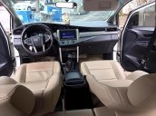 Cần bán Toyota Innova E MT sản xuất 2017, màu trắng, odo 25.000 km