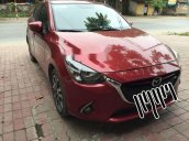 Gia đình bán xe Mazda 2 sản xuất 2016, màu đỏ