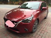 Gia đình bán xe Mazda 2 sản xuất 2016, màu đỏ