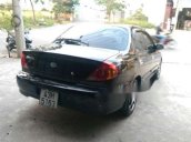 Cần bán xe Kia Spectra sản xuất 2005, màu đen chính chủ  