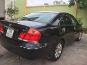 Bán xe Toyota Camry năm 2003, màu đen 