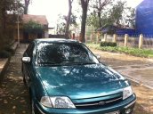 Đang có nhu cầu nâng cấp xe cần bán xe cũ Ford Laser Ghia 1.6