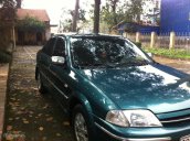 Đang có nhu cầu nâng cấp xe cần bán xe cũ Ford Laser Ghia 1.6