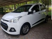 Cần bán Hyundai Grand i10 1.0AT sản xuất 2014, màu trắng xe gia đình