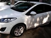 Cần bán Mazda 2 S đời 2015, màu trắng, xe nhập chính chủ