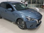 Cần bán Mazda 2 sản xuất 2018, màu trắng, giá 569tr