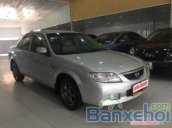 Cần bán lại xe Mazda 323 đời 2003, màu bạc