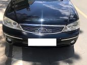 Bán lại xe Ford Laser 2004, màu đen, xe nhập