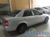 Cần bán lại xe Mazda 323 đời 2003, màu bạc