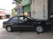 Cần bán lại xe Ford Laser 2005, màu đen, giá tốt