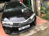 Bán ô tô Toyota Corolla Altis 1.8G AT sản xuất 2015, màu đen chính chủ