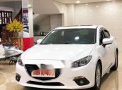 Cần bán lại xe Mazda 3 sản xuất 2015, màu trắng xe gia đình giá cạnh tranh