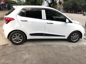 Bán ô tô Hyundai Grand i10 1.0 AT năm 2015, màu trắng, xe nhập  