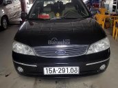 Cần bán Ford Laser năm sản xuất 2004, màu đen số tự động