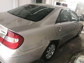 Bán xe Toyota Camry sản xuất 2002, màu bạc chính chủ, 300 triệu