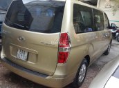 Bán Hyundai Starex số sàn, máy dầu, nhập khẩu Hàn Quốc 2012 bản ghế xoay, màu vàng cát, biển Sài Gòn