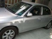 Bán xe Kia Spectra sản xuất 2004, màu đen, 100tr