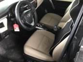 Chính chủ cần bán Toyota Corolla altis 1.8 AT, màn hình hiển thị kỹ thuật số, sản xuất năm 2016, màu đen