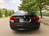 Cần bán lại xe BMW 5 Series 520i đời 2014, màu đen, giá tốt