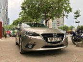 Cần bán xe Mazda 3 2.0 đời 2015, màu vàng cát