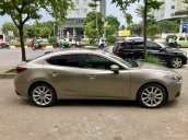 Cần bán xe Mazda 3 2.0 đời 2015, màu vàng cát