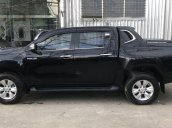 Cần bán gấp Toyota Hilux 3.0G 4X4 đời 2015, màu đen số tự động, 708 triệu