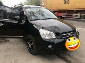 Cần bán Kia Carens 2011, màu đen số sàn, 279tr