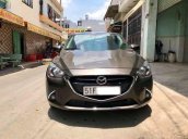 Cần bán xe Mazda 2 năm 2016, màu nâu xe gia đình, giá chỉ 500 triệu