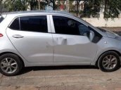 Bán xe Hyundai Grand i10 E có con  chính chủ năm 2015, màu bạc