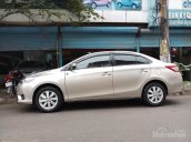 Bán Toyota Vios E 1.5AT năm 2016 vàng nâu