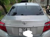 Cần bán xe Toyota Vios J 2014, màu bạc