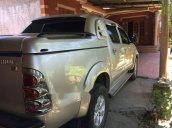 Bán ô tô Toyota Hilux năm sản xuất 2011, màu vàng cát