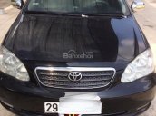 Bán Toyota Corolla altis 1.8G MT 2004, màu đen số sàn, 295tr