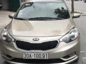 Bán Kia K3 1.6 MT năm 2014, màu vàng cát