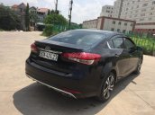 Bán xe Kia Cerato sản xuất 2017 AT, màu đen, 585 triệu