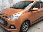 Bán Hyundai Grand i10 1.0 AT năm 2014, màu cam